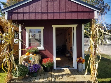 Maroon Old Hickory Shed for sale with autumn accessories